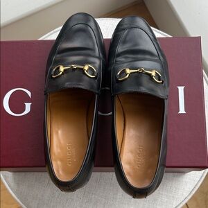 Gucci Black Leather Slip-On Loafers with Gold Detail